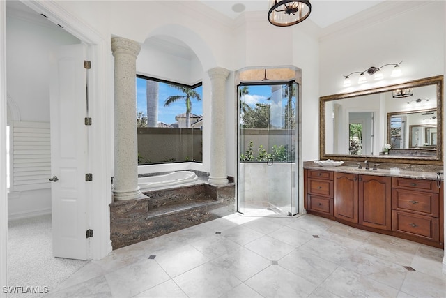 bathroom with vanity, crown molding, tiled bath, tile patterned floors, and ornate columns