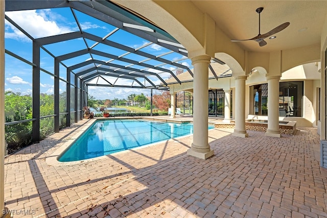 view of pool featuring a patio, a lanai, and ceiling fan