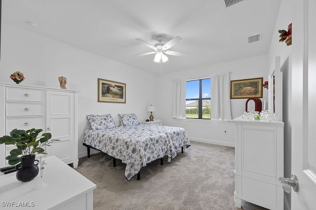 carpeted bedroom with ceiling fan