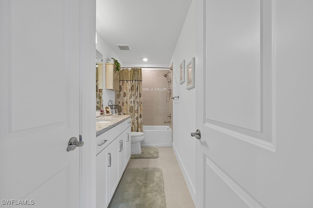 full bathroom featuring toilet, shower / tub combo with curtain, vanity, and tile patterned floors