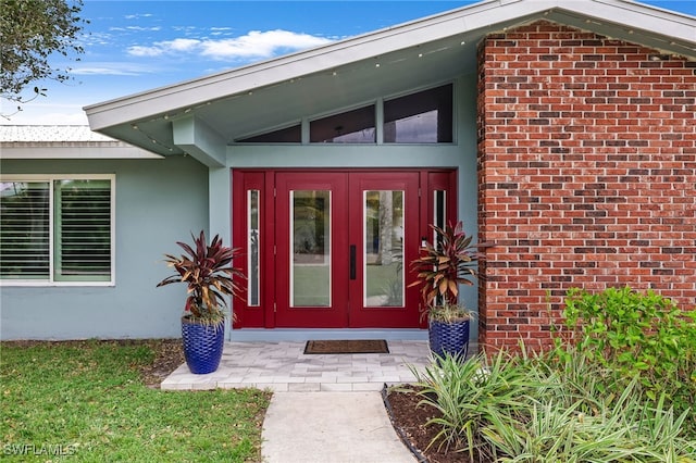 doorway to property with french doors