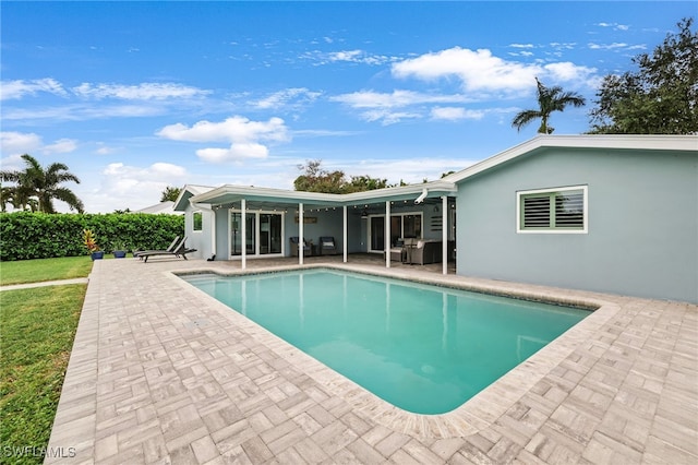 view of pool with a patio area