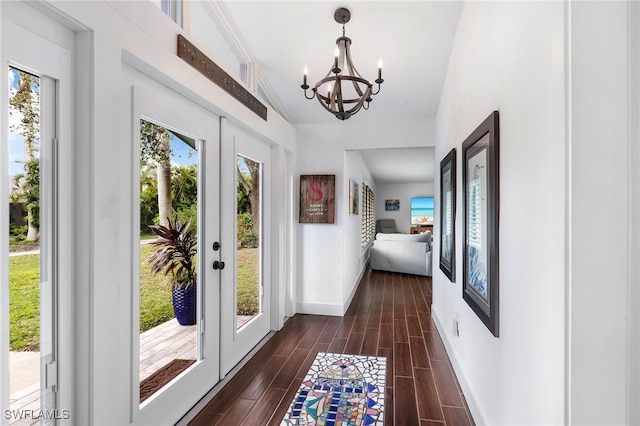 interior space featuring crown molding, dark hardwood / wood-style floors, and a healthy amount of sunlight