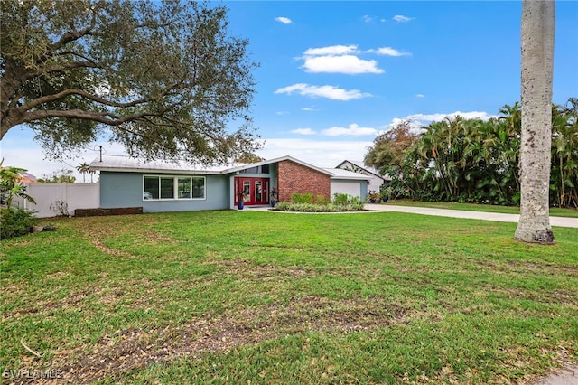 single story home with a front yard