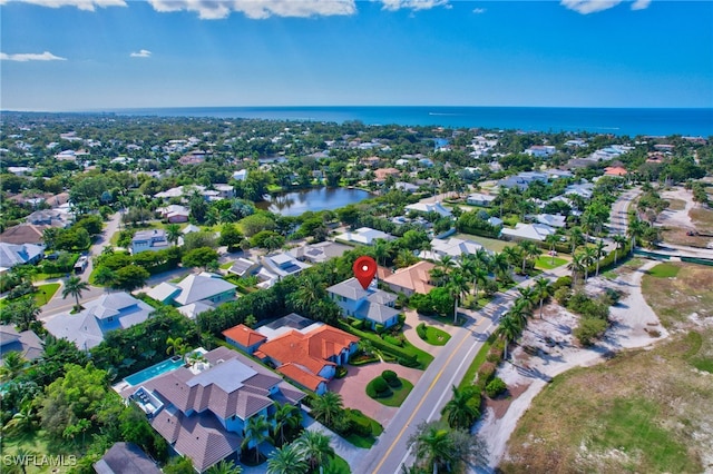 drone / aerial view featuring a water view