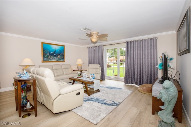 living room with light hardwood / wood-style flooring, ornamental molding, and ceiling fan