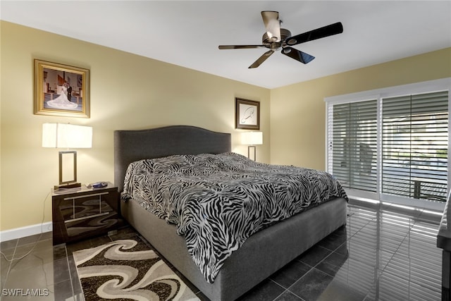 tiled bedroom featuring access to exterior and ceiling fan