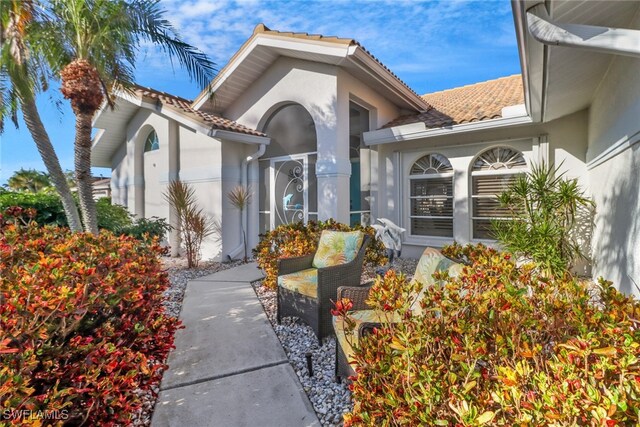 2822 SE 22nd Pl, Cape Coral, FL 33904 - exterior space with stucco siding and a tile roof