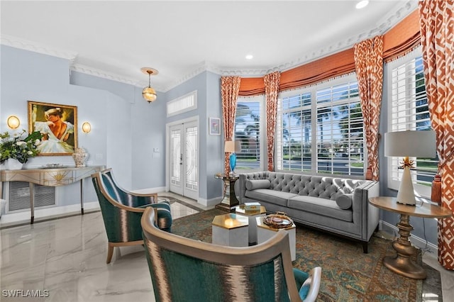 sitting room featuring french doors, plenty of natural light, and ornamental molding