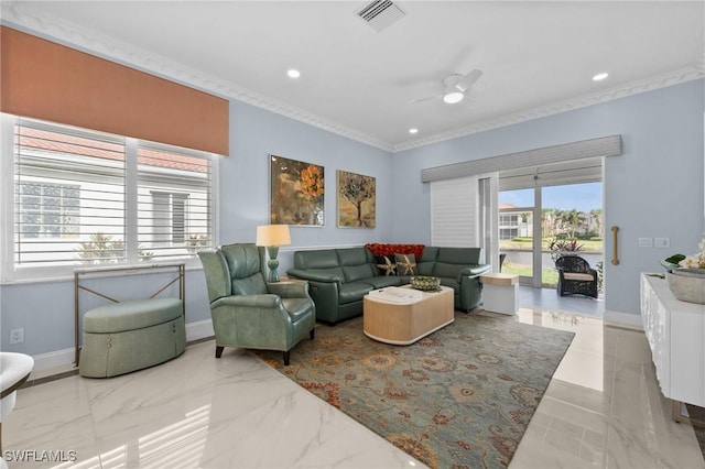 living room featuring ceiling fan and crown molding