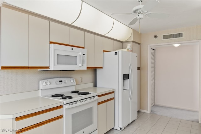 kitchen featuring white appliances, light countertops, a ceiling fan, and visible vents