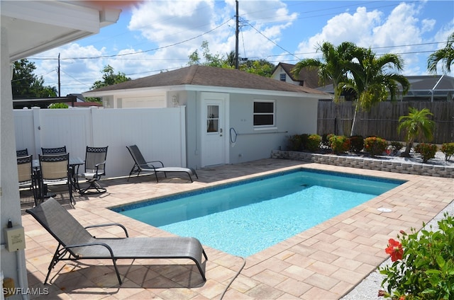 view of pool featuring a patio area