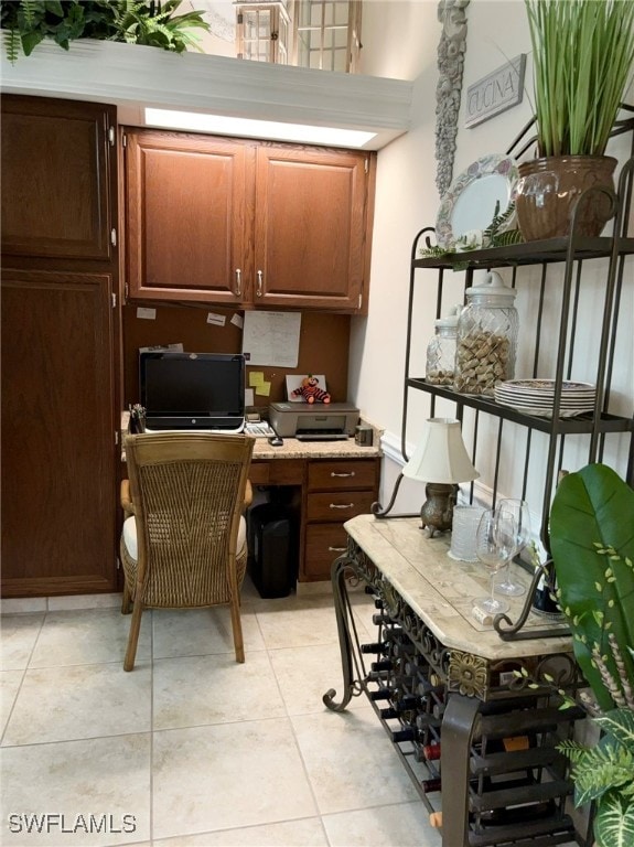 office with light tile patterned floors