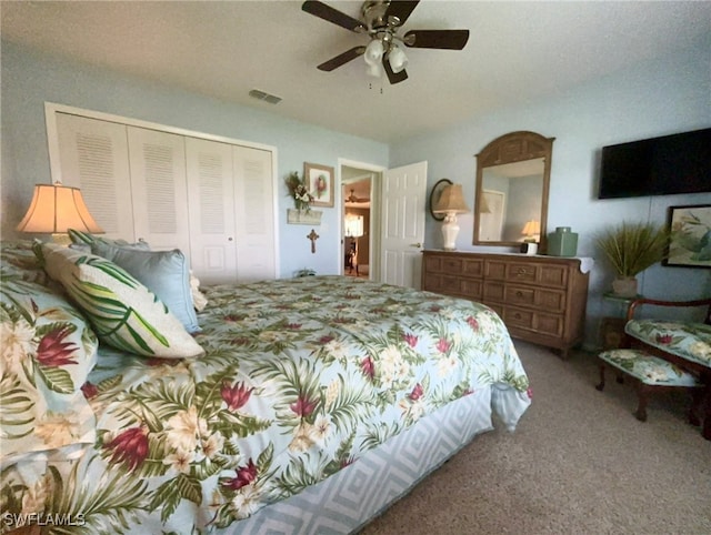 bedroom featuring a closet, carpet, and ceiling fan