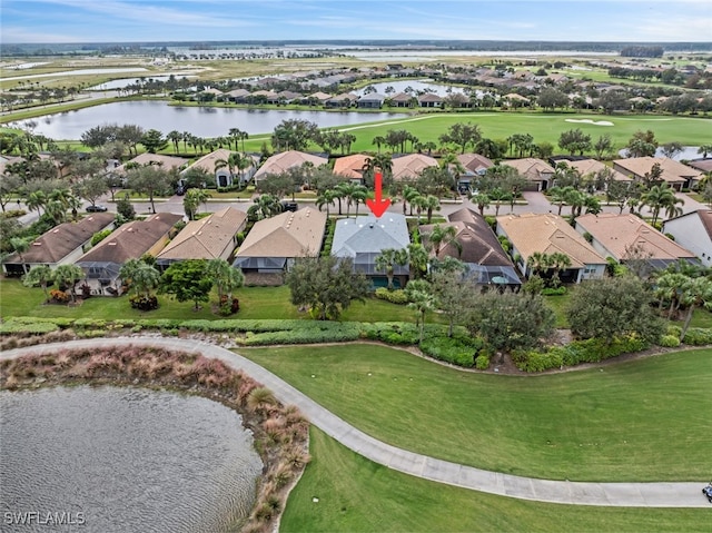 drone / aerial view with a water view