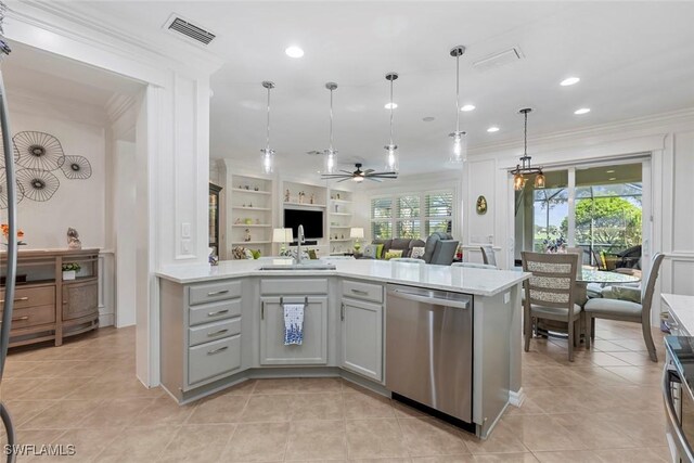 kitchen with sink, ceiling fan, decorative light fixtures, stainless steel dishwasher, and crown molding