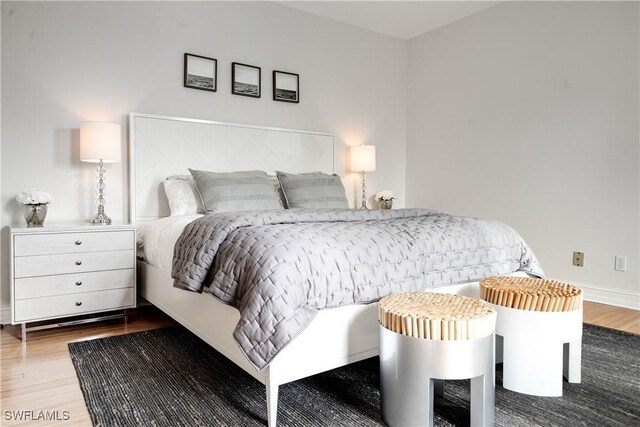 bedroom featuring hardwood / wood-style floors