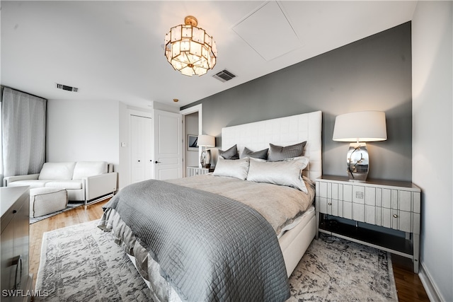 bedroom with light wood-type flooring