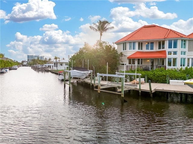 dock area featuring a water view and boat lift