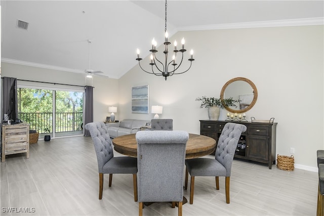 dining room with ceiling fan with notable chandelier, ornamental molding, and vaulted ceiling