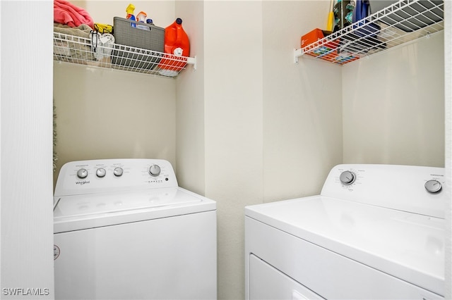 laundry area featuring washer and clothes dryer