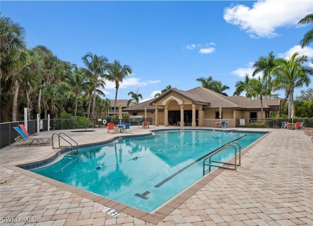 view of pool featuring a patio area