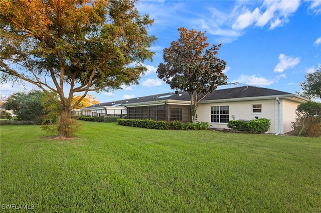 view of yard with a lanai