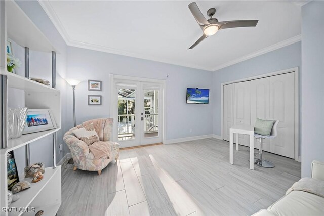 living area with ceiling fan, light hardwood / wood-style floors, crown molding, and french doors