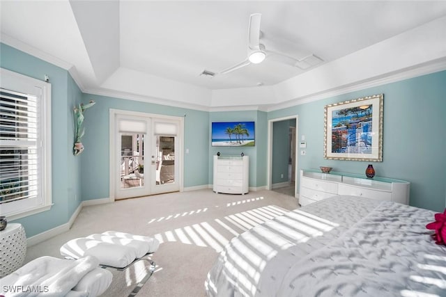 bedroom featuring ceiling fan, light colored carpet, crown molding, and multiple windows