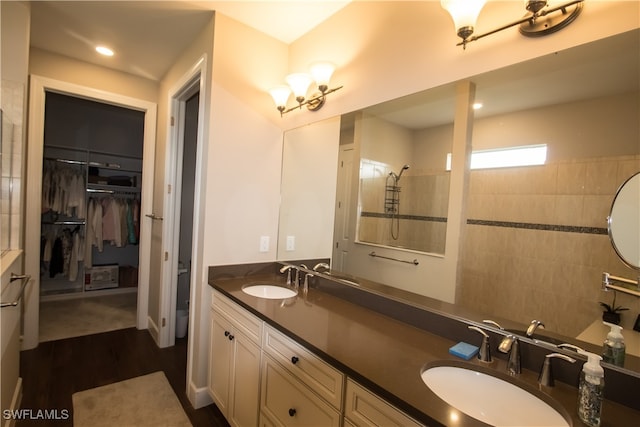 bathroom featuring vanity and hardwood / wood-style flooring