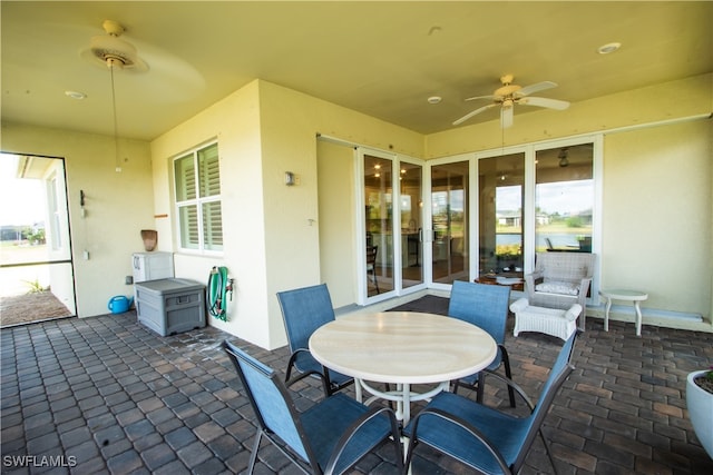 view of patio with ceiling fan