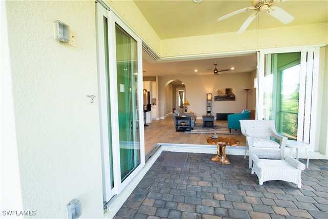 view of patio with ceiling fan