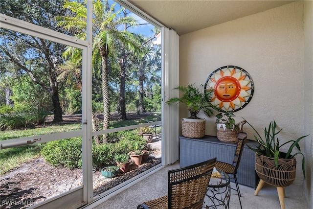 sunroom / solarium with a healthy amount of sunlight