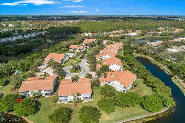 drone / aerial view with a water view