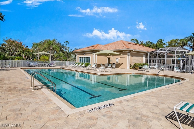 view of swimming pool featuring a patio