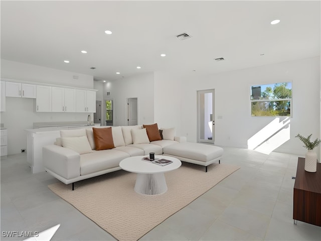 living room featuring sink