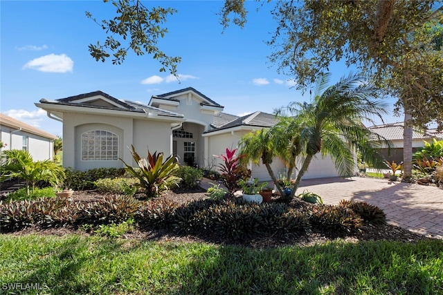 view of front of property with a garage