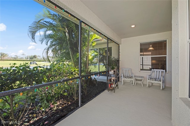 sunroom / solarium with a healthy amount of sunlight