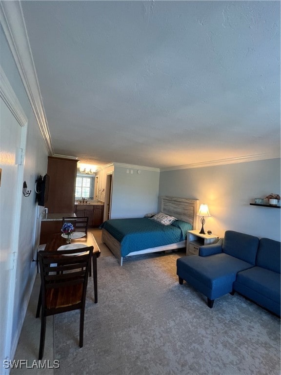 bedroom with crown molding and carpet