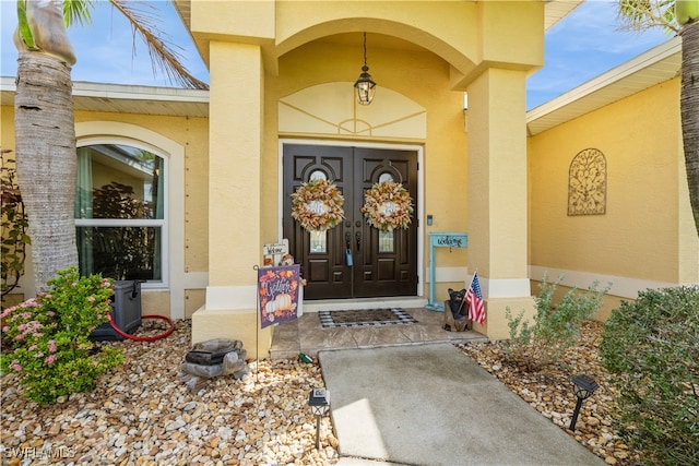 doorway to property with covered porch