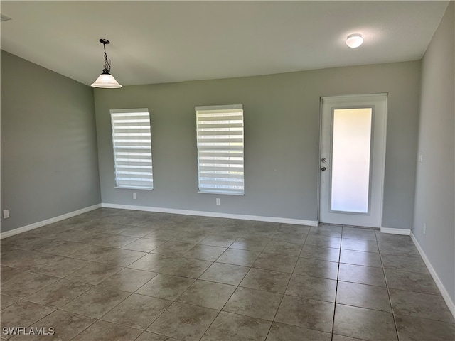 view of tiled spare room