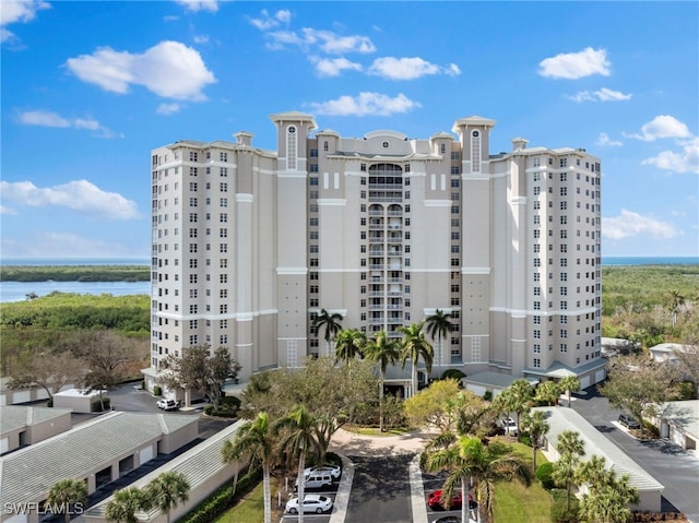 1001 Arbor Lake Dr Unit 307, Naples, FL 34110 - view of apartment building / complex featuring a water view