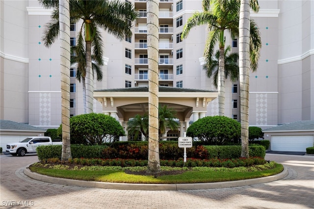 1001 Arbor Lake Dr Unit 307, Naples, FL 34110 - view of apartment building / complex featuring decorative driveway