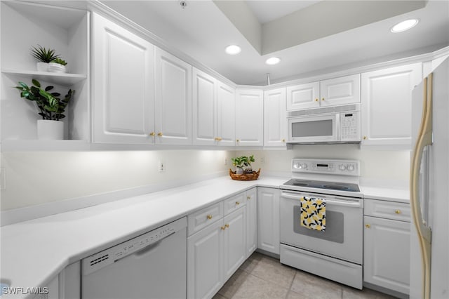 1001 Arbor Lake Dr Unit 307, Naples, FL 34110 - kitchen featuring white appliances, recessed lighting, open shelves, white cabinetry, and light countertops