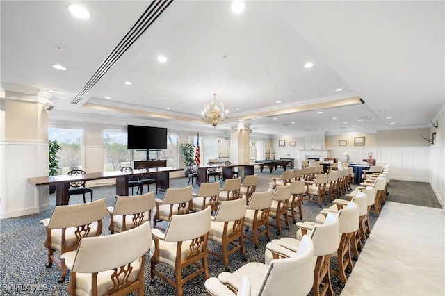 1001 Arbor Lake Dr Unit 307, Naples, FL 34110 - dining room featuring crown molding, a tray ceiling, a decorative wall, recessed lighting, and carpet