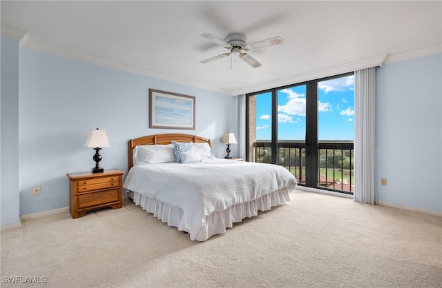 bedroom featuring floor to ceiling windows, light carpet, ceiling fan, access to exterior, and ornamental molding