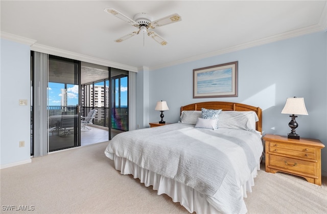 carpeted bedroom featuring access to outside, ceiling fan, and crown molding