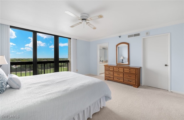 carpeted bedroom with ceiling fan, ornamental molding, access to outside, and connected bathroom