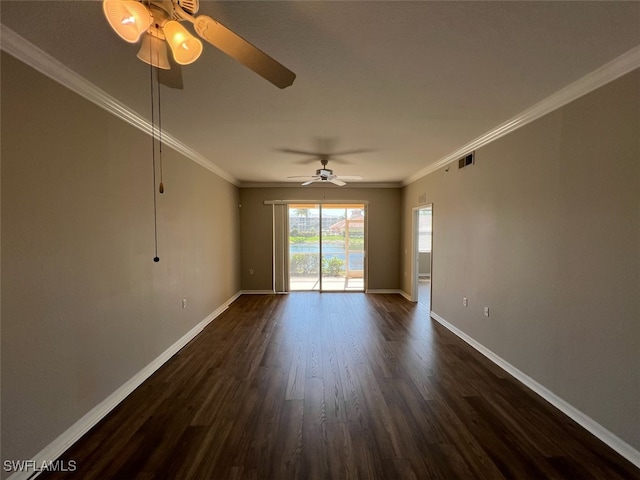 empty room featuring ceiling fan, ornamental molding, and dark hardwood / wood-style floors