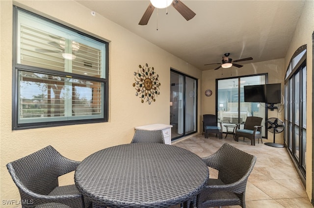 view of patio / terrace featuring ceiling fan